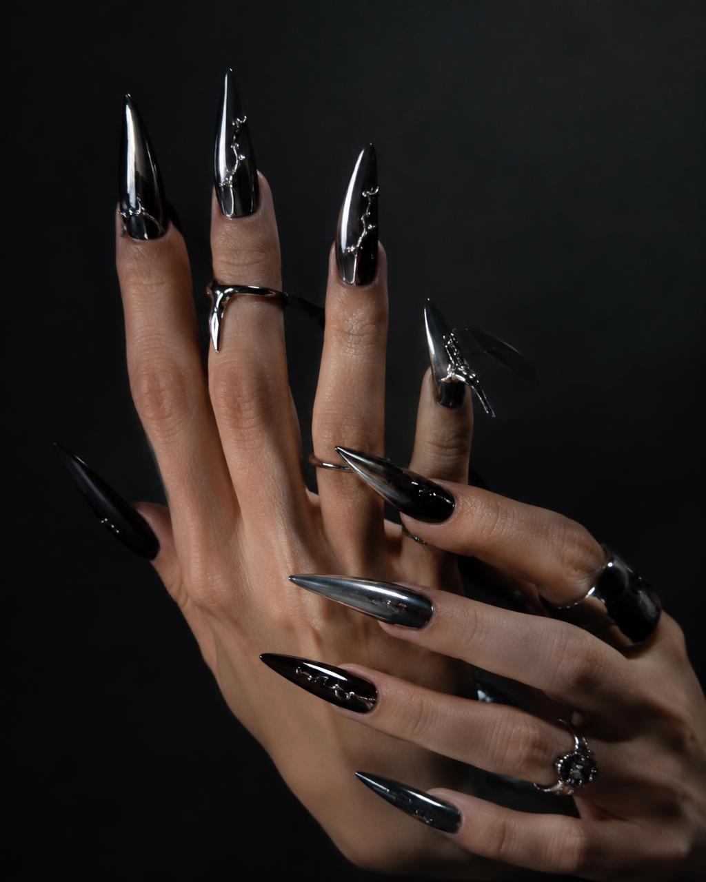 Black chrome stiletto nails